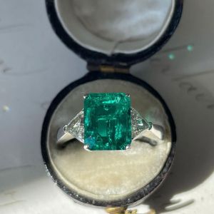 Three Stone Emerald & Trillion Cut Engagement Ring