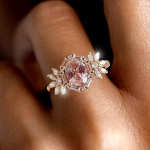 Rose Gold Halo Oval Cut Pink Sapphire Engagement Ring