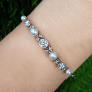 Elegant Round Cut Pearl & White Sapphire Bracelet