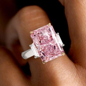 Two Tone Three Stone Radiant Cut Pink Sapphire Engagement Ring