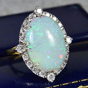 Two Tone Oval Cut Opal Halo Engagement Ring For Women