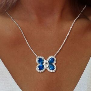 Halo Oval Cut Blue Sapphire Butterfly Shape Pendant Necklace For Women