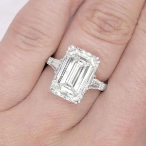 Emerald Cut Three Stone Engagement Ring