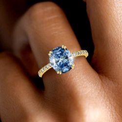 Golden Oval Cut Blue Sapphire Engagement Ring