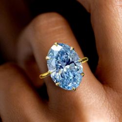 Golden Solitaire Oval Cut Aquamarine Sapphire Engagement Ring